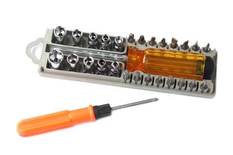 A precision screwdriver set with multiple interchangeable bits and sockets, isol Stock Photos