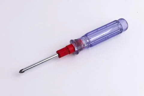 Precision screwdriver tool with transparent handle isolated on white backgrou Stock Photos