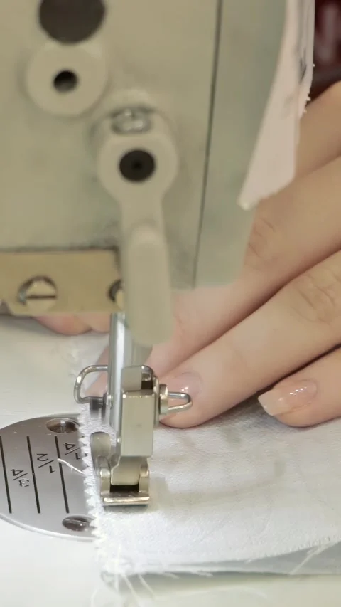 Precision Stitches Shaping Fabric on Automated Garment Equipment 스톡 동영상 344618231
