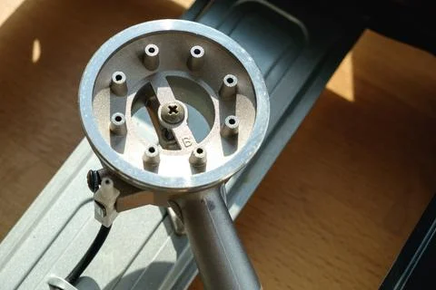 Precision tool on workbench highlights craftsmanship in sunlight Stock Photos