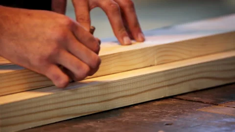 Precision Woodworking Meticulously Crafting Lines with Careful Attention and Video stock 281708910