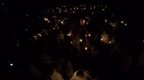 Predawn candlelight for Timkat (Epiphany) in Gondar, Ethiopia Stock Footage 62281409
