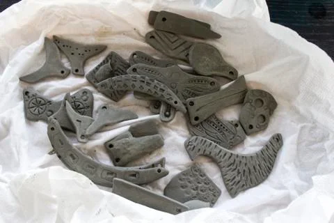 Predesign process of small dough figures Stock Photos