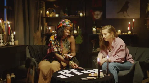 Prediction Session with Tarot Cards in Fortune Tellers Studio Stock Footage 247628986