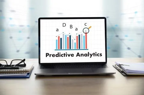 Predictive Analytics Businessman working at office desk and using computer an Stock Photos