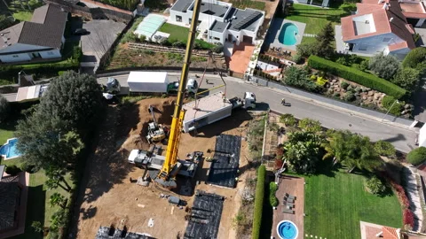 Prefabricated house module unloading ope... | Stock Video | Pond5