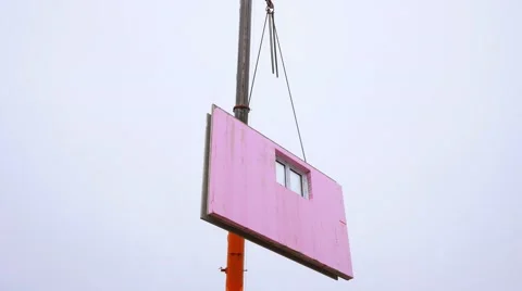 Prefabricated house, workers in setting up the basement walls Stock Footage 62052581