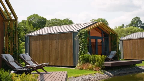 Prefabricated mobile modular container house outdoor near the lake Stock Footage 282298989