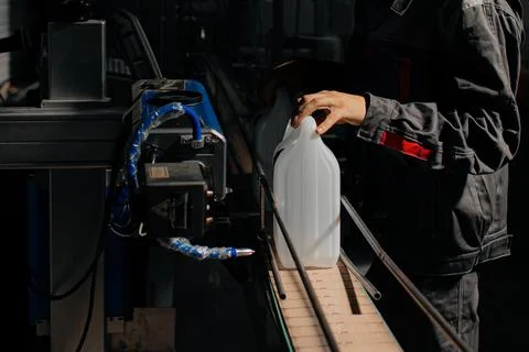 The preform shape of PET bottle in the blowing mold machine. The operation of Stock Photos