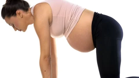 Pregnancy exercises on a white background Stock Footage 144983348