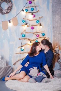 Pregnancy New Year father mother Stock Photos