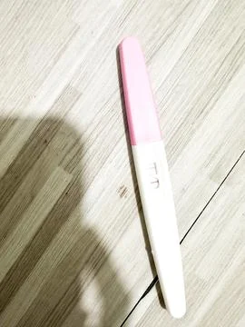 Pregnancy Test Kit with Positive Two Lines Stock Photos