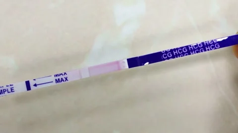 Pregnancy test with negative one line result in bathroom process Stock Footage 274441889