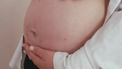 Pregnant Belly with Stretch Marks Close Up Authentic Maternity Video stock 328936688