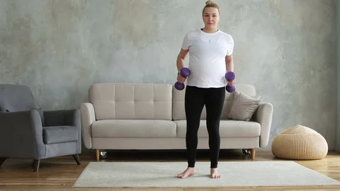Pregnant dancing at home Stock Footage 127357282