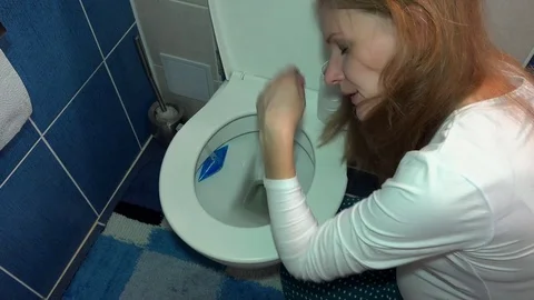 pregnant female girl vomiting in toilet ... | Stock Video