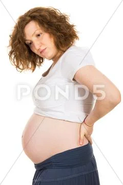 Pregnant having back ache Stock Photos