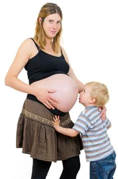 Pregnant mother with a little boy brother Stock Photos