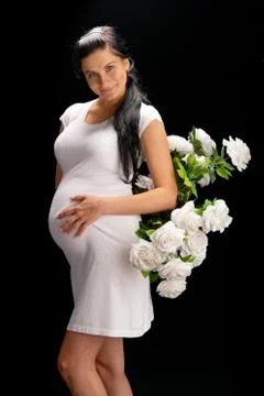 Pregnant with roses Stock Photos