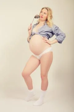 Pregnant with serving spoon Фото