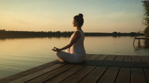 Premium Photo  Asian pregnant woman yoga on the beach sunset