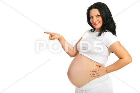Pregnant woman pointing Stock Photos
