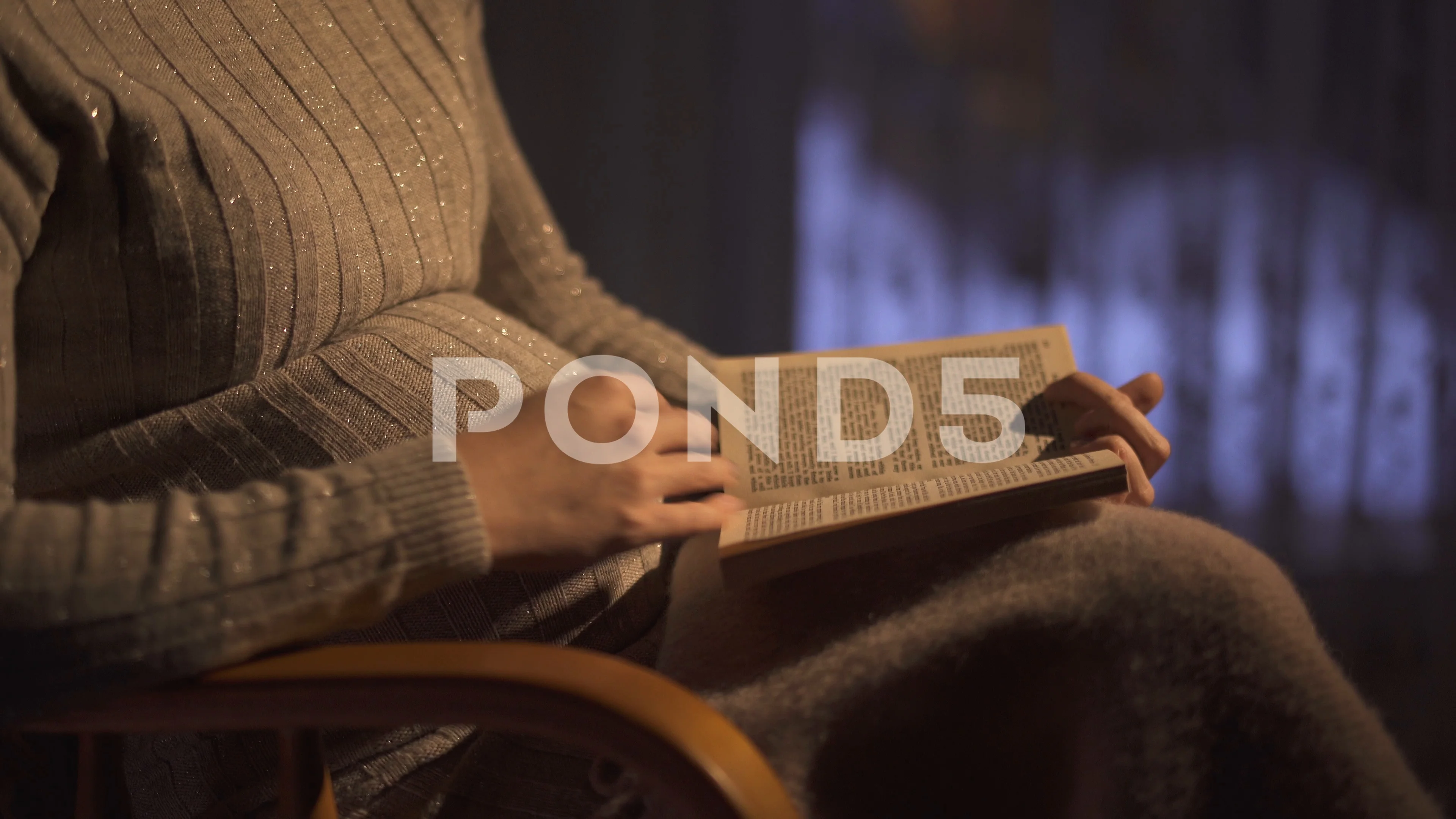 https://images.pond5.com/pregnant-woman-reading-book-sitting-101304152_prevstill.jpeg