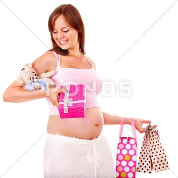 Pregnant woman with shopping bag. Stock Photos