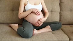 Pregnant Woman lifting her Dress up and , Stock Video
