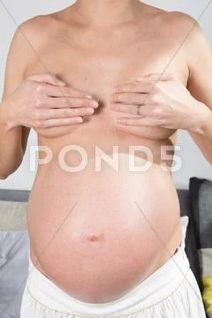 A Pregnant Woman On A White Background
