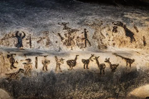 Prehistoric art wall cave paintings Stock Photos