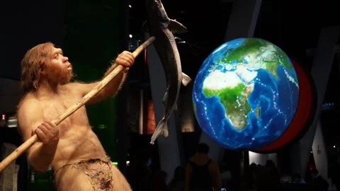 Prehistoric man with globe in the background Stock Footage 174920421