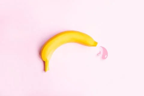 Premature ejaculation contraception concept. Big yellow banana and drops of Stock Illustration
