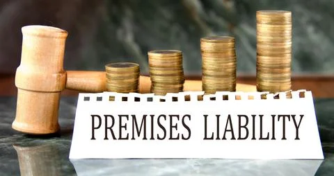 PREMISES LIABILITY - words on a white sheet with a judge's gavel and a stack  Stock Photos