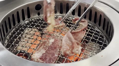 Premium A5 Wagyu Beef Grilling on Hot BBQ Grill Stock Footage 340539420