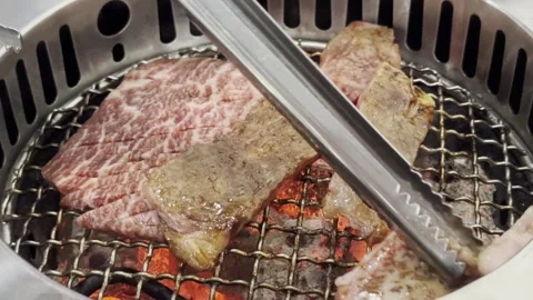 Premium A5 Wagyu Beef Grilling on Hot BBQ Grill 動画素材 341177938