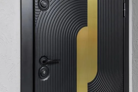 Premium black security door featuring a unique embossed arched texture and a  Photos