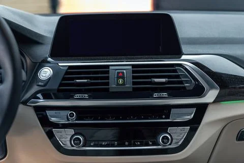 Premium car interior with multimedia display and dashboard. Control panel, ra Stock Photos