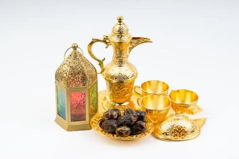 Premium dates, lantern and arabic coffee set on white background. Stock Photos