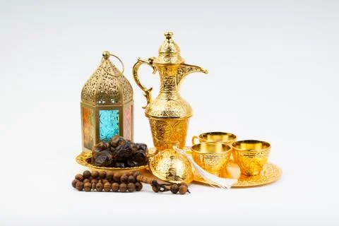 Premium dates, lantern and arabic coffee mug on white background. 写真素材