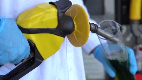 Premium gas: cientist checks it - slow motion Stock Footage 178557589