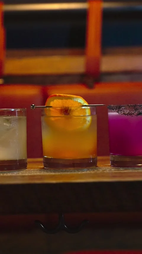 Premium mixed drink captured in stylish bar environment. Stock Footage 333647829