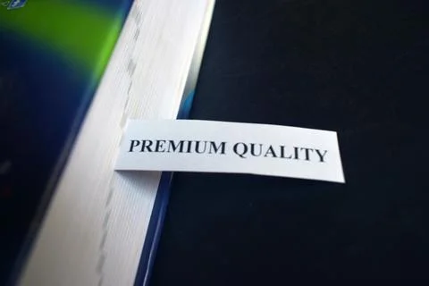 Premium Quality Message on Paper Insert Representing Excellence and Value Fotos Stock