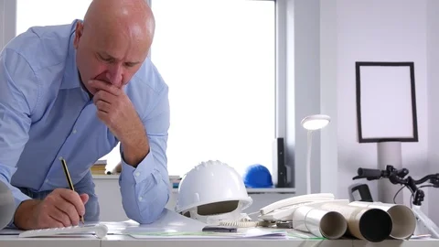 Preoccupied Engineer Write Think and Analyze Technical Documents in Office Stock Footage 101116924