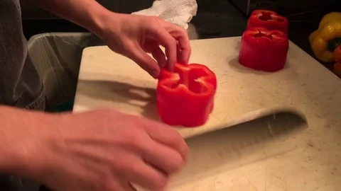 Prep Cook Cuts Bell Peppers in Restaurant Stock Footage 82211724