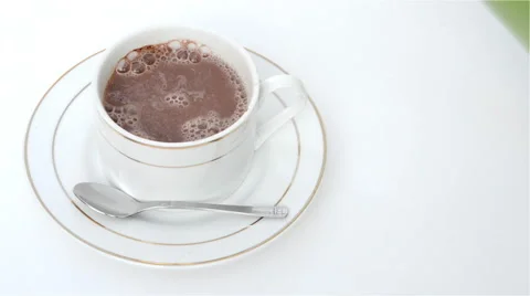 Preparation and making hot chocolate, pouring  water and stiring Stock Footage 44895237