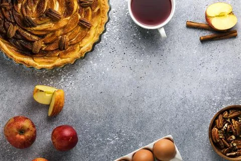 Preparation of apple cake for tea, table and ingredients Stock Photos