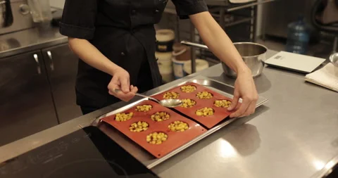 Preparation of apple desserts in a silicone baking tray. Stock Footage 263484987