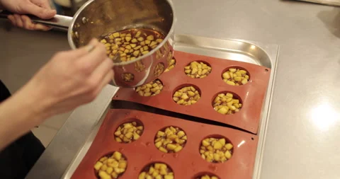 Preparation of apple desserts in a silicone baking tray. Stock Footage 263486846