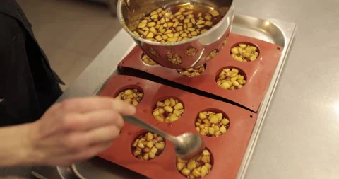 Preparation of apple desserts in a silicone baking tray. Stock Footage 263486902